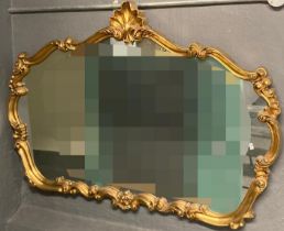 Modern 'C' scroll and shell design gilt framed over mantle mirror. 85cm high approx. (B.P. 21% +