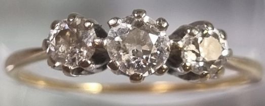 Gold diamond three stone ring. 2g approx. Size R. (B.P. 21% + VAT)