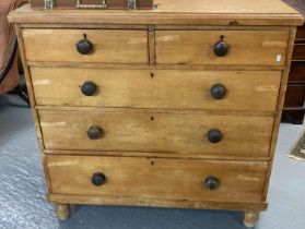 Victorian pine straight front chest of four drawers with stained knob handles on baluster turned