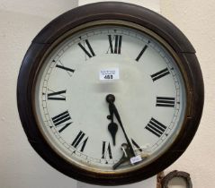 Victorian mahogany framed single train wall clock with painted face and Roman numerals with key. (