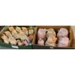 Three boxes of assorted novelty teapots in form of cottages and pigs together with a box of