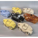 Set of six Sadler ceramic novelty teapots in the form of racing cars together with another ceramic