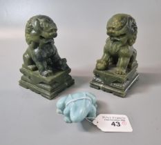 Pair of carved green soap stone Temple Lions. 12cm high approx. together with a pale carved stone