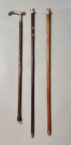 Three walking canes, one with yellow metal knop, one with engraved hallmarked silver knop