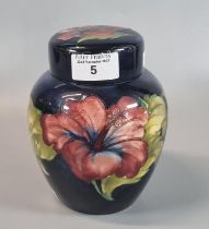 Moorcroft pottery tube-lined Anemone ginger jar and cover on a cobalt blue ground, signed and