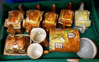 Four boxes/crates of novelty teapots in the form of cottages etc. (4) (B.P. 21% + VAT)