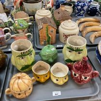 Five trays of mainly ceramic novelty preserve jars and covers: chutney, beetroot etc., teapots to