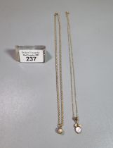 Two 9ct gold silver fine chains each with pendants, a pearl and another. 5.5 g approx. (B.P. 21% +