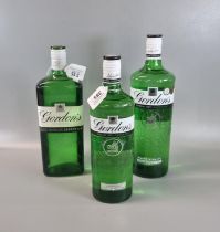 Three bottles of Gordon's Special Dry London Gin, one marked 'The Original'. 2 x 1L. 37.5% vol.