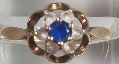 9ct gold clear and blue stone flowerhead dress ring. 1.6g approx. Size J1/2. (B.P. 21% + VAT)