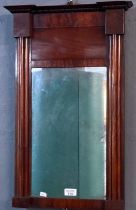 19th century mahogany pier glass with fluted columns under a beaded cornice. Overall 66x36cm approx.