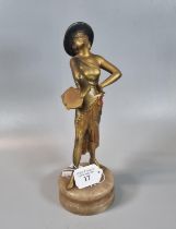 Art Deco design study of a gilded lady with tambourine on alabaster base. 28cm high approx. (B.P.