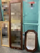 Oak framed bevelled mirror with strapwork decoration, a gilt framed mirror and a large bevelled