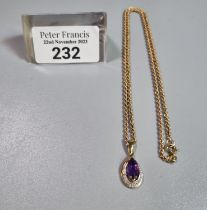 9ct gold chain with 9ct gold and purple stone pendant. 3.6g approx. (B.P. 21% + VAT)