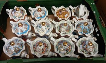 Three trays of assorted modern pottery novelty teapots. (3) (B.P. 21% + VAT)