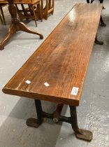 Early 20th century pine top cast iron bench with pine stretcher together with a 20th century oak and