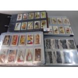 Cigarette cards, collection in four albums, Senior Service, Ogdens, Players, Wills etc. good range
