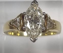 18ct gold Marquis diamond ring. 2.5 carats approx. 6.8g approx. Size O. (B.P. 21% + VAT)