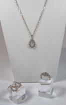 14ct gold and champagne diamond necklace and pendant with pair of matching earrings and ring. 13.