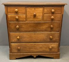 Late Victorian pale oak Scotch straight front chest of drawers, the moulded cornice above central