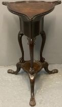 18th century Irish mahogany washstand, the triangular shaped dish top above cabriole legs and ball