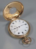 9ct gold half hunter keyless top wind pocket watch with white enamel face, having Roman numerals and