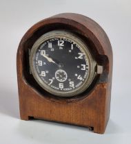 WWII period German aircraft clock, now set in a wooden mantle case, opening to reveal script '