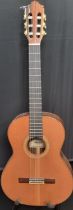 Handmade Spanish Almansa model 461 No. 48030093 six string acoustic guitar. Together with Hiscox