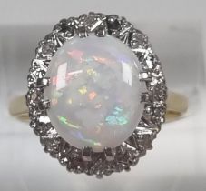 18ct gold opal and diamond ring. 4.8g approx. Size P1/2. (B.P. 21% + VAT)