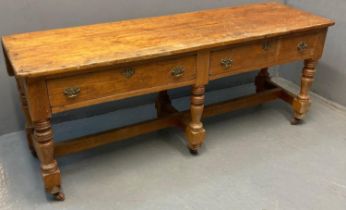 19th Century pine farmhouse dresser base, the moulded top with drop leaf to the reverse, above two