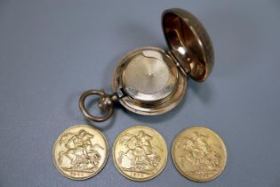 Gold plated Dennison Sovereign holder comprising one Victorian sovereign dated 1893 and two George V