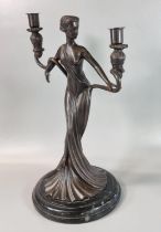 After Erte, Paris, Art Nouveau style bronze two section candelabra in the form of a semi nude maiden