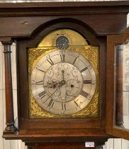 18th century oak eight day long case clock marked 'W Parkinson, Lancaster', having arched brass face