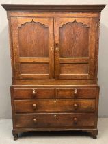 Late 18th/early 19th century Welsh oak two stage press cupboard, the moulded cornice above two blind