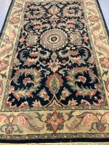 Hand made full wool pile Indian tea washed Agra cream and black ground rug, overall with floral