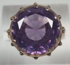 14ct gold large amethyst facetted ring in claw setting. 5.4g approx. Size M1/2. (B.P. 21% + VAT)