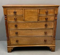 Victorian oak Scotch chest of drawers, the moulded top above an arrangement of three square cock