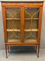 Edwardian satin wood display cabinet, the moulded cornice above a marquetry inlay of swags and