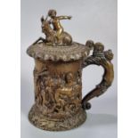 19th century French bronze lidded tankard with pictorial scene of relief moulded cherubs, goat and