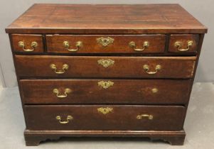 18th century oak chest of drawers, the moulded top above an arrangement of four long and two small