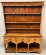 19th century oak two stage rack back pot board dresser, the moulded cornice with iron hooks and