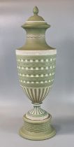 19th century Wedgwood sage green and white urn shaped vase and cover. Impressed marks to the