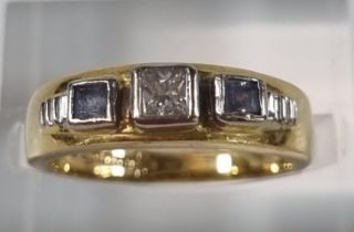 18ct Clogau diamond and sapphire three stone ring. 4.1g approx. Size K. With COA in associate