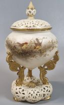Royal China Works Worcester porcelain potpourri jar and cover, raised on three scrolled supports