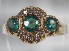 18ct gold diamond and emerald ring. 3.6g approx. Size O (B.P. 21% + VAT)