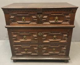 Jacobean oak straight front chest of drawers, the moulded and dental top above a bank of three