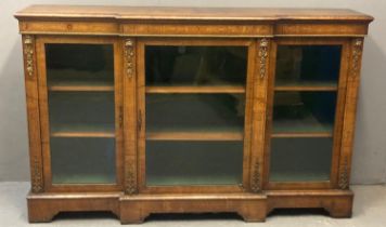 Victorian walnut and marquetry inlaid break front credenza, the moulded top above three glazed