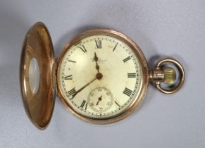 9ct gold half hunter Waltham keyless top wind pocket watch, with white enamelled face, having