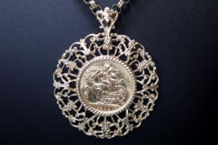 Late Victorian gold full Sovereign dated 1893 in ornate 9ct gold pendant mount together with a 9ct