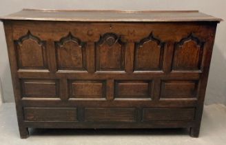 18th century Welsh oak coffer, probably Cardiganshire, the moulded top above five ogee pointed